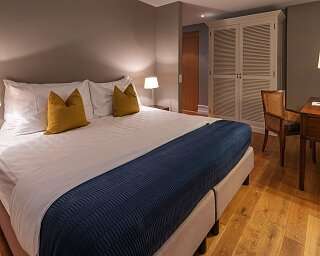 Blue City Hotel The Apartment Schlafzimmer